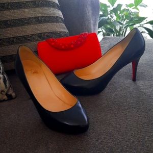 Christian Louboutin/ Red bottoms